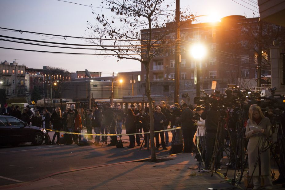 Members of the media converge on December 14 in front of an apartment at 1313 Grand Street in Hoboken, New Jersey. The apartment is believed to be connected to the Connecticut elementary school shooting.