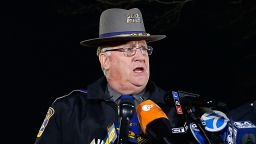 Connecticut State Police spokesman Lt. J. Paul Vance, center, briefs the media on the elementary school shootings during a press conference at Treadwell Memorial Park on December 14, in Newtown.