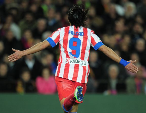 Falcao runs away to celebrate at a stunned Camp Nou as Atletico takes the lead with their third opportunity of a pulsating first-half.
