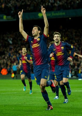 With halftime approaching, Sergio Busquets pounces inside the penalty area to fire home his first goal of the season after Atletico failed to clear its lines.