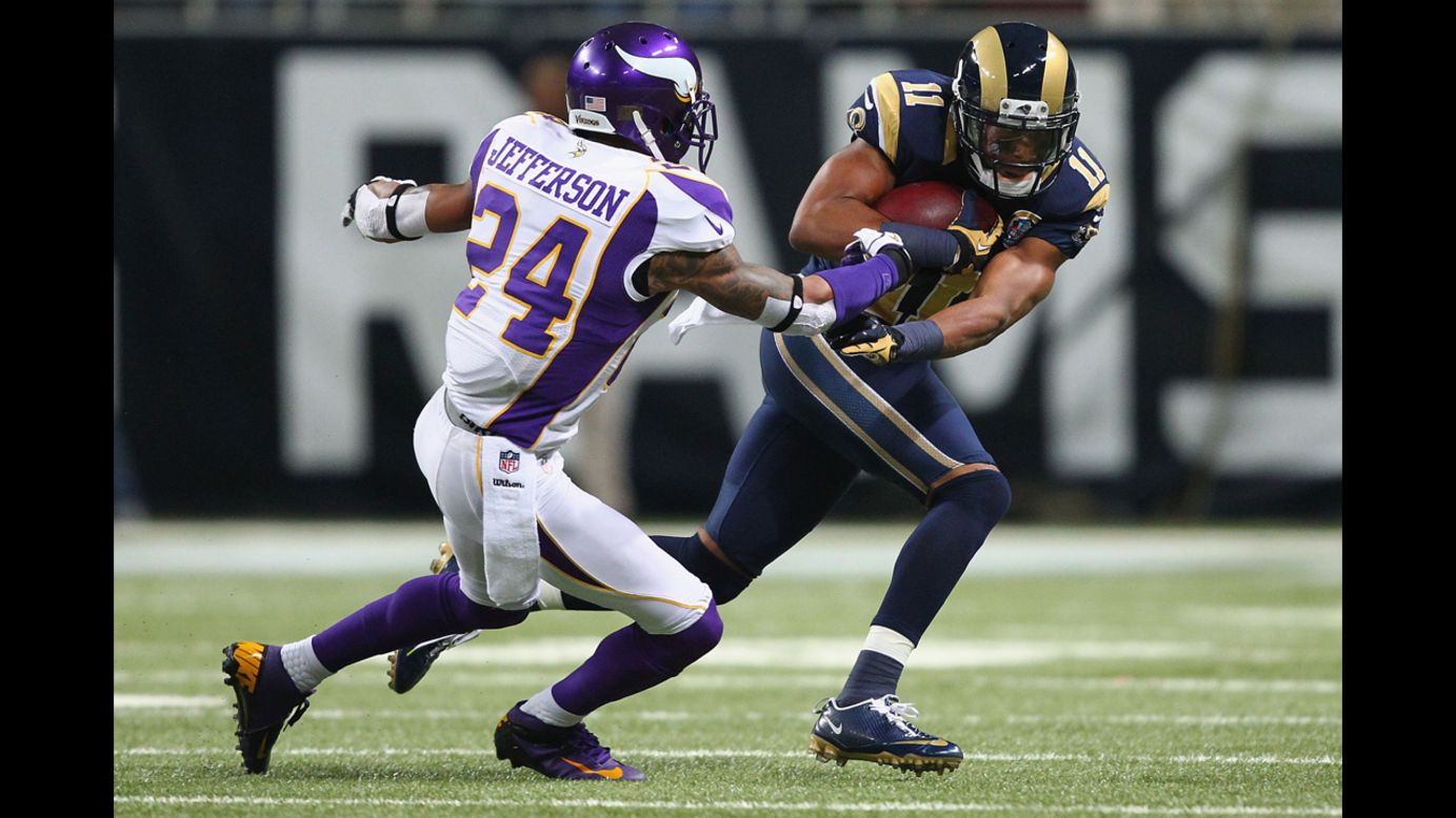 A.J. Jefferson of the Vikings attempts to tackle Brandon Gibson of the Rams on Sunday.