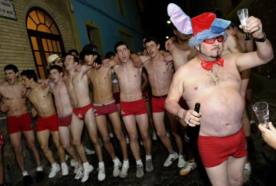 Revelers take part in the 30-year-old 'San Silvestre' New Year's race in brightly colored underwear at La Font de la Figuera, Valencia, Spain. In Italy, Spain and South and Central America, color-coded underpants take on special meaning at New Year with red or yellow auguring luck or romance.