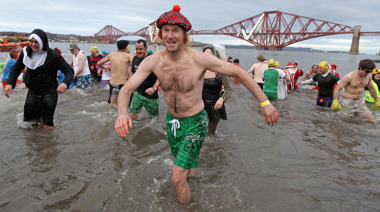Every year around a 1000 New Year revellers brave freezing conditions in the River Forth in front of the Forth Rail Bridge during the annual Loony Dook Swim. <br /><br />Similar sub-zero New Year soaks are found across the chillier corners of the northern hemisphere from Sweden to Siberia. 