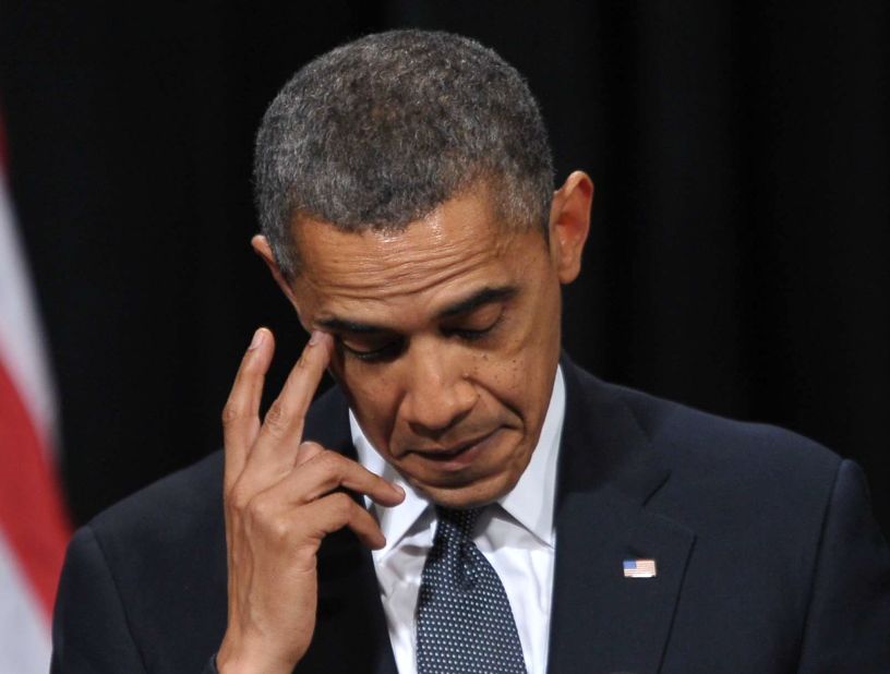 President Obama appears to dab at a tear while delivering his remarks. 