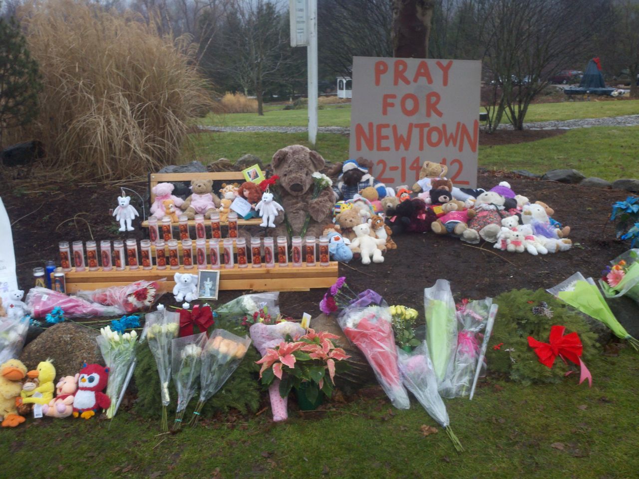 Ken Henggeler started this memorial to the victims of the shooting at the intersection of Main Street and Sugar Street in Newtown, Connecticut.