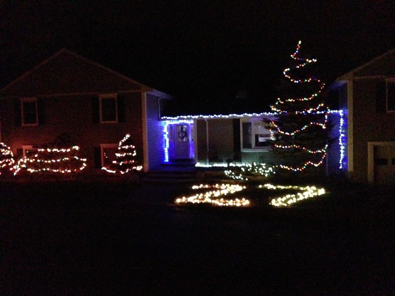 Ryan Emrich rearranged his house's Christmas lights to memorialize the 27 lives lost in Newtown. 