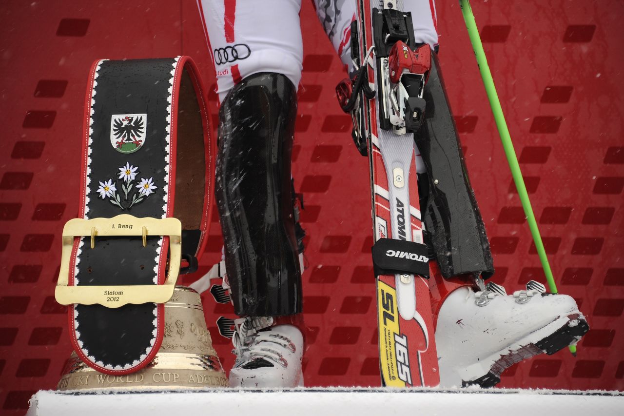 Watch any ski race on TV and you will hear the same dull, persistent background clanging of cowbells ringing. Marcel Hirscher's feet are pictured here next to a cowbell during the podium ceremony of the men's slalom race at the FIS Alpine Skiing World Cup in January 2012.
