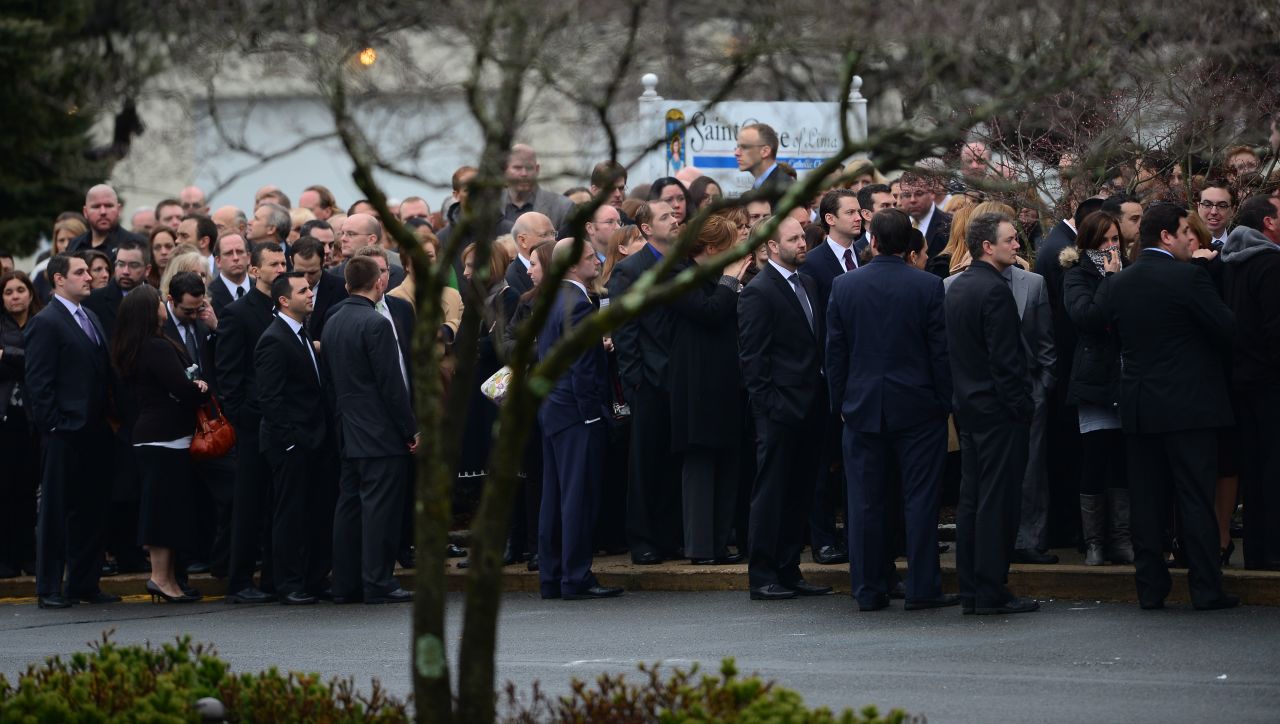 People arrive for the funeral of Jessica Rekos, 6, at St. Rose of Lima Roman Catholic Church in Newtown on December 18.