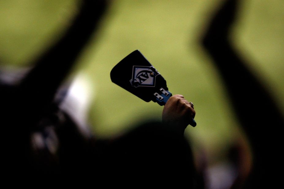 Cycling and triathlon are increasingly the domain of the cowbell. Tennis racket manufacturers gave away branded versions at the U.S. Open. Here a fan of the Tampa Bay Rays is pictured holds up a cow bell during game one of the 2008 MLB World Series against the Philadelphia Phillies.