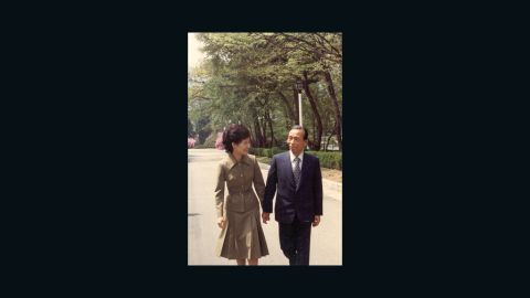 Park Geun-hye walks with her late father and former president Park Chung-hee in 1977.