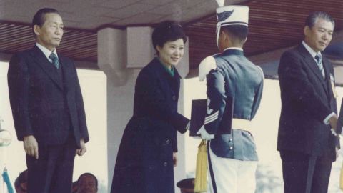 Park Geun-hye, now a South Korean presidential candidate, shakes hands with graduates of Air Force Academy in 1979.