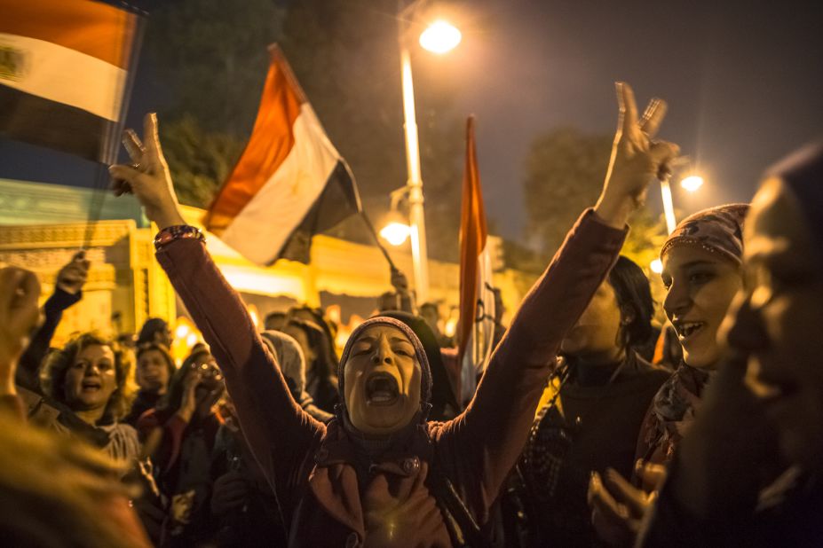 Protesters chant slogans during a demonstration at the Presidential Palace on December 18 in Cairo. 