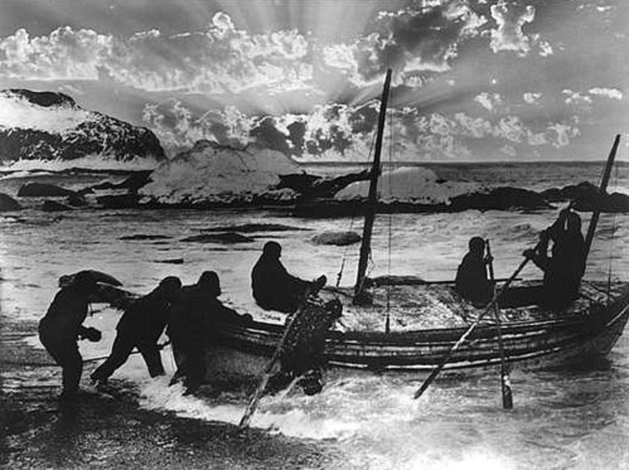 This original picture from 1916 shows Ernest Shackleton and his five man crew embarking on the 800 nautical mile rescue mission across the Antarctic after losing their ship in the ice.