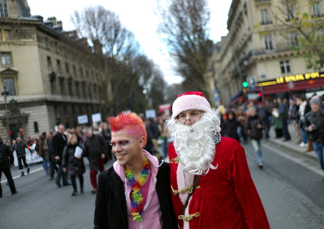 A man dressed up as Santa Claus appears at a demonstration in Paris for the legalization of same-sex marriage on December 16. 