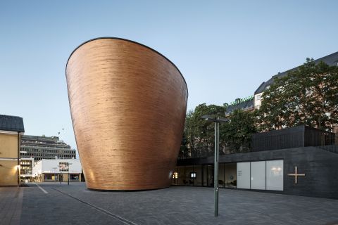 Situated between two big shopping malls in the heart of Helsinki, the Kamppi Chapel of Silence, designed by K2S Architects, surprises by its minimalist form. <br />© <a href="http://www.uusheimo.com/" target="_blank" target="_blank">Tuomas Uusheimo</a>