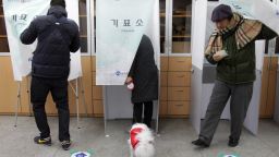 South Koreans cast their votes for a new president in a polling station in Seoul. Ruling Seanuri Party candidate Park Geun-hye and opposition Democratic United Party Moon Jae-in have been in a close race during the election campaign. 