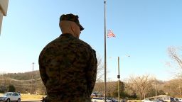 dnt tn former marine stands guard outside school_00011228