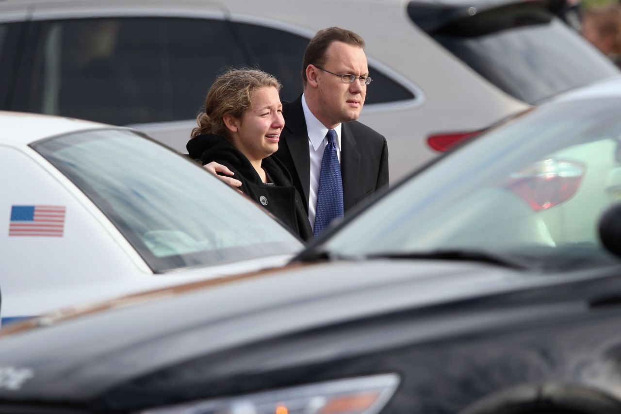 Family and friends depart Jessica's funeral on December 18 in Newtown.