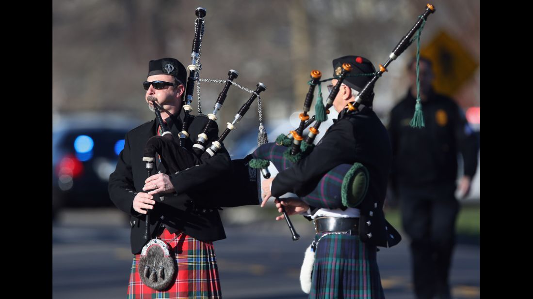 Bagpipers play at funeral services for Soto on December 19 in Stratford.
