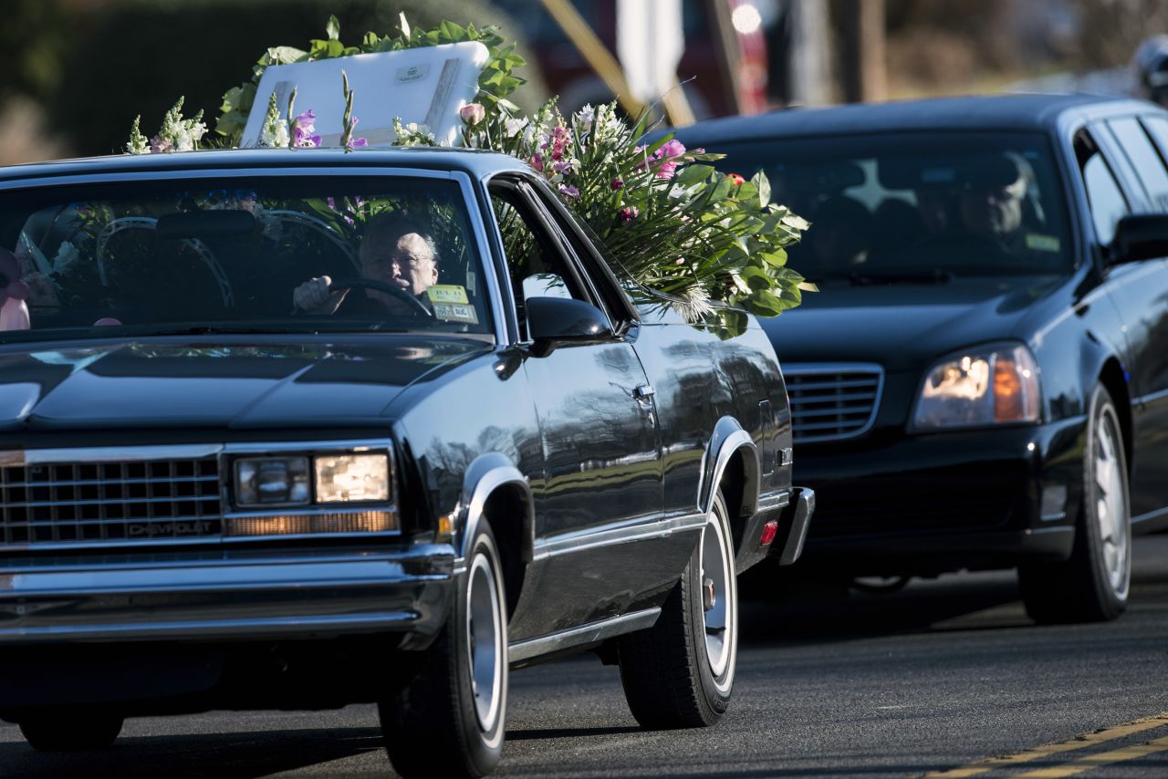 A procession arrives for the funeral of Victoria Soto, 27, at Lordship Community Church in Stratford, Connecticut, on December 19. Soto was a first-grade teacher being hailed as a hero for protecting the children in her class during last week's school massacre in Newtown.