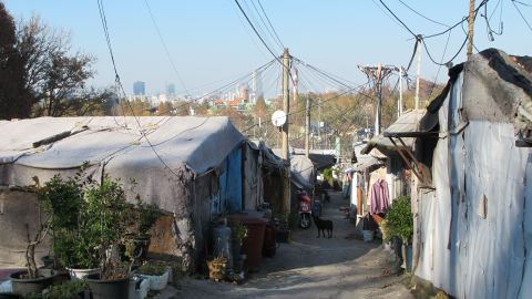 In the south of Seoul's posh Gangnam District, Guryong village is a shantytown filled with shacks made of wood and iron.