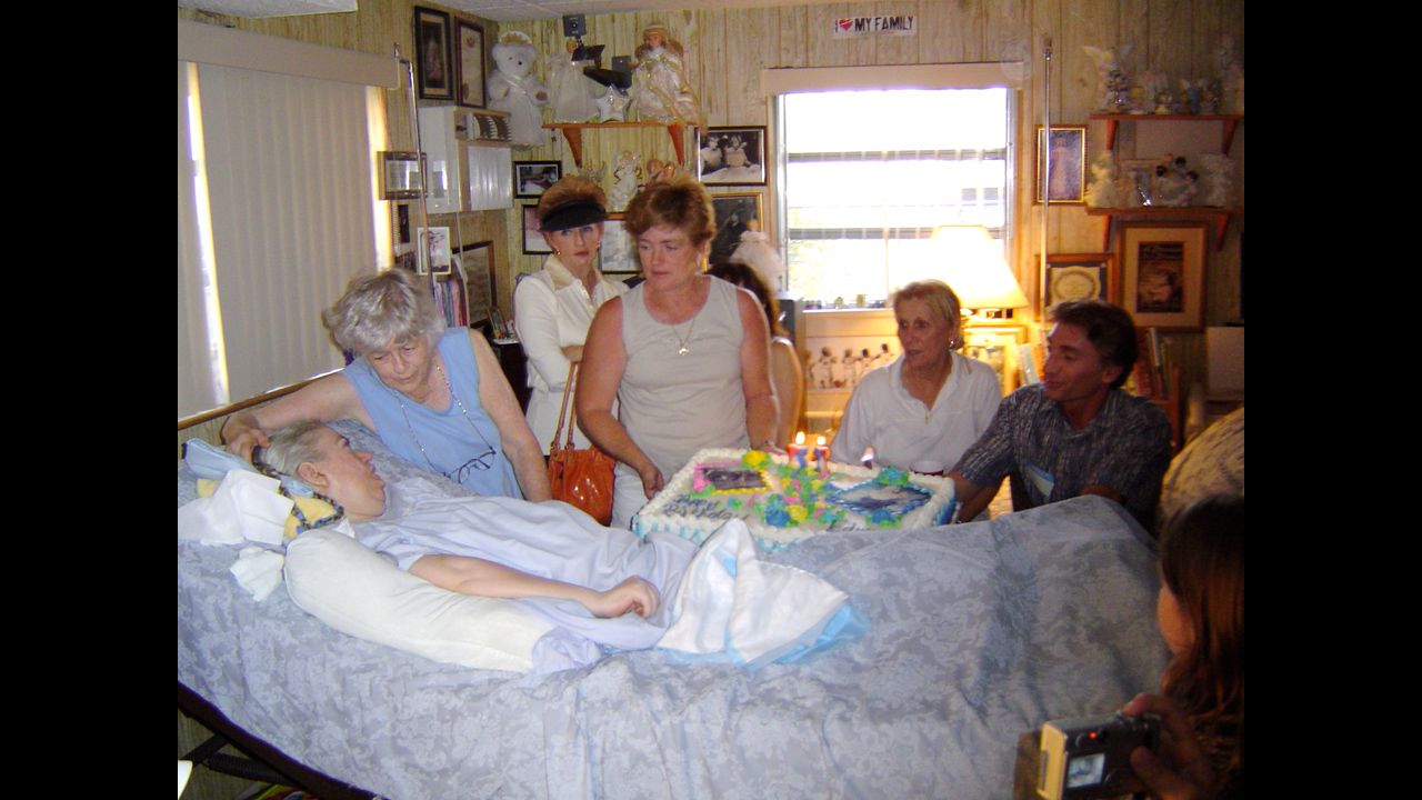 Family and friends celebrate Edwarda's 51st birthday.