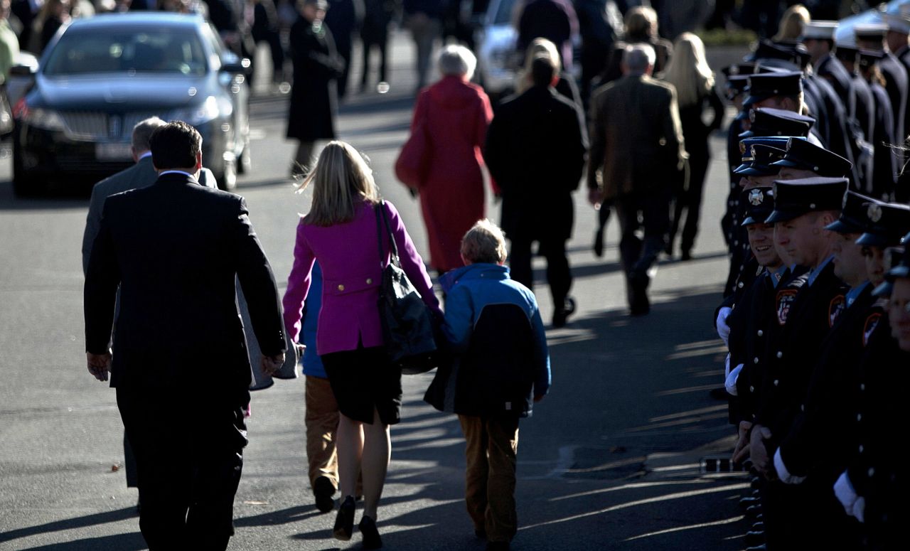 Mourners enter St. Rose of Lima Church for the funeral of Charlotte Bacon, 6, on December 19, in Newtown.