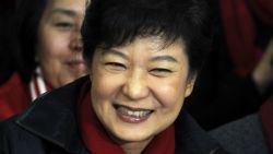 South Korean President-elect Park Geun-Hye, of the Ruling Saenuri Party celebrates with her party members during their applause after she is declared the winner of the presidential elections on December 19, 2012 in Seoul, South Korea. Park, daughter of former president Park Chung-Hee, becomes the first female president of South Korea. (Photo by Song Kyung-Seok-pool/Getty Images)
