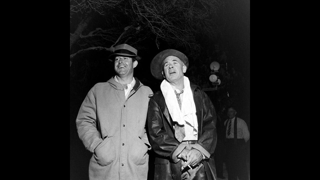 Director Frank Capra, right, stands with an unidentified man on the set.