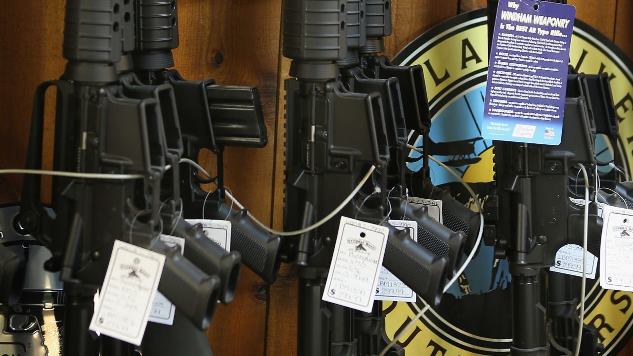 AR-15 style rifles are offered for sale at a sporting goods store in Tinley Park, Illinois, in December 2012 .