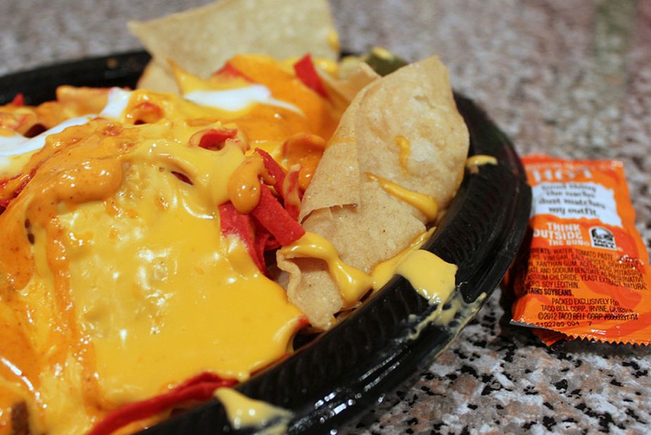 <strong>Taco Bell's Volcano Nachos:</strong> These molten cheese-laden nachos with spicy ground beef, pinto beans, and jalapeños break the nutrition bank with 970 calories and 58 grams of fat -- more calories and fat than any other single item on the menu -- plus 1,670 milligrams of sodium. 