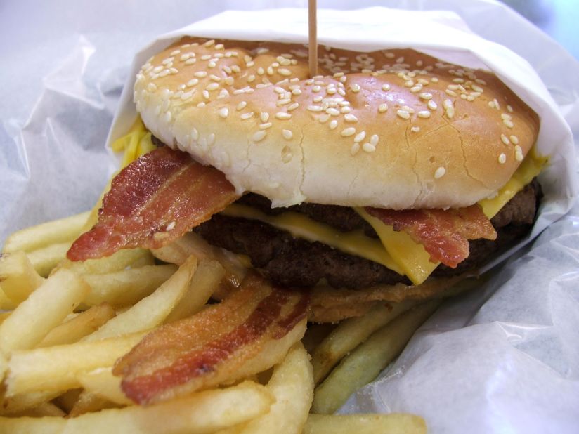 <strong>Hardee's 2/3-lb Monster Thickburger:</strong> This two-patty monstrosity is a beef-lover's dietary downfall. With three slices of American cheese and four bacon strips, it has 1,300 calories, 93 grams of fat and 2,860 milligrams of sodium. That's without a soda or fries. 
