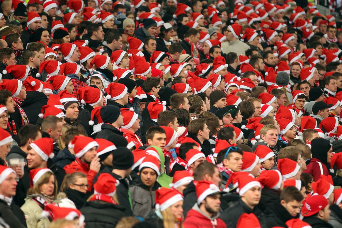 Stuttgart fans don Santa hats during a German Cup match between VfB Stuttgart and 1. FC Köln on December 19 in Stuttgart, Germany. 