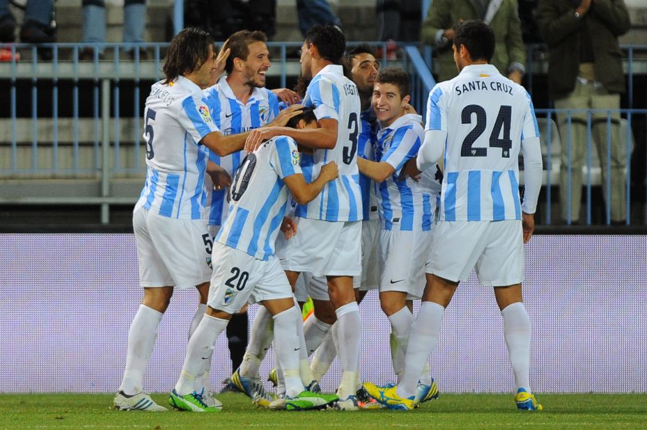 Spanish club Malaga, which reached the quarterfinals of the Champions League in 2013, was banned from European competition by UEFA for a year after failing to pay its bills.