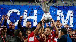Syrian players raise the trophy as they celebrate their victory over Iraq in the final of the 7th West Asia Football Federation (WAFF) championship in Kuwait City, on December 20, 2012. AFP 