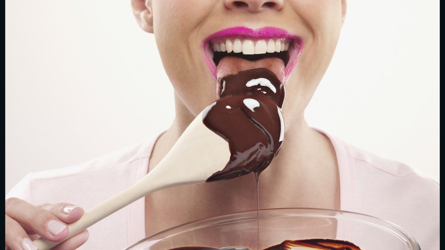 spoon licking chocolate baking