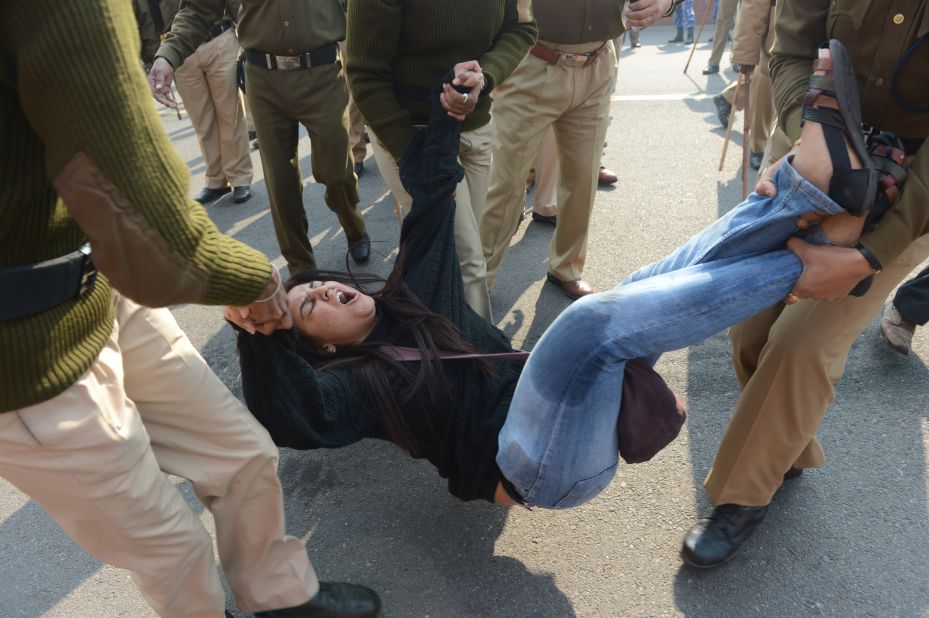 Police arrest a demonstrator during a protest on December 22. Sunday's attack sparked furious protests across India, where official data show that rape cases have jumped almost 875% over the past 40 years -- from 2,487 in 1971 to 24,206 in 2011.