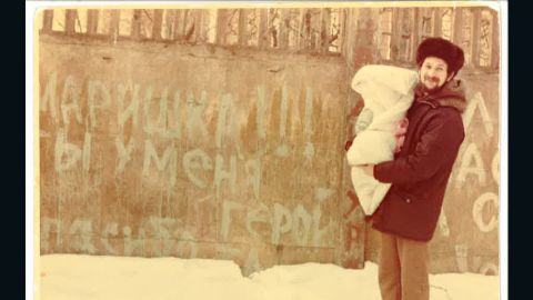 Unable to see his sick wife for a week after she gave birth, Lev Furman painted a message on a wall outside the hospital.