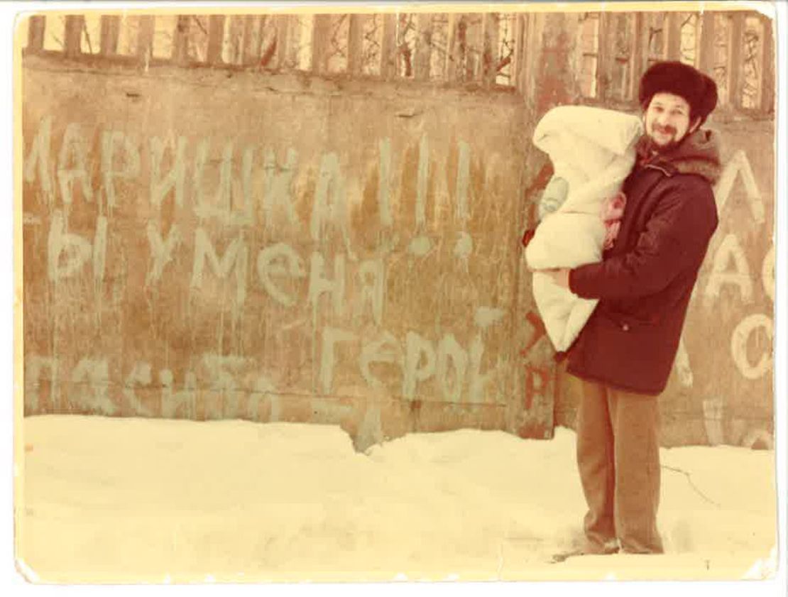 Unable to see his sick wife for a week after she gave birth, Lev Furman painted a message on a wall outside the hospital.