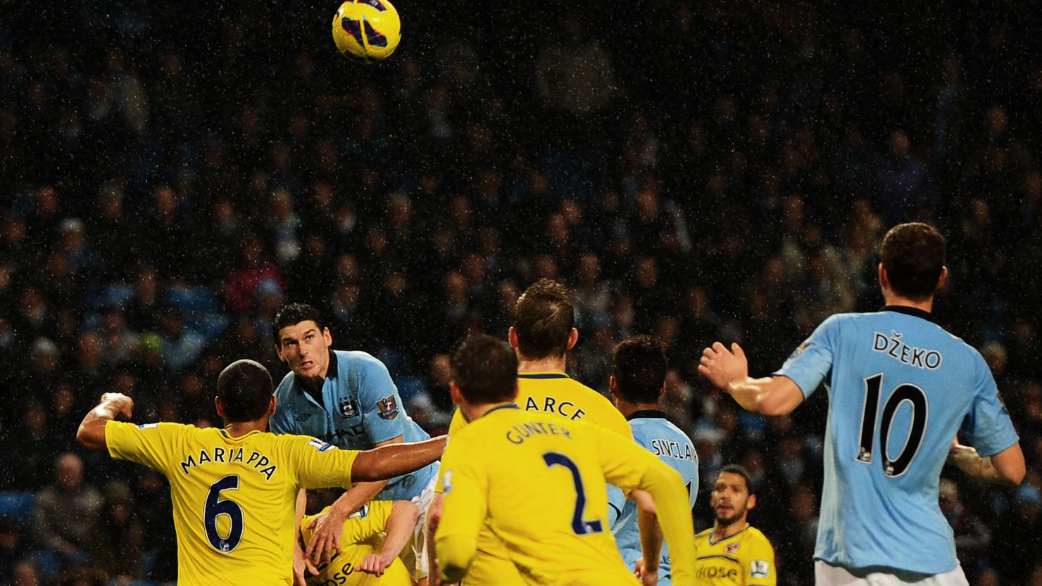 Gareth Barry scores the winner against Reading at a rainy Etihad Stadium to close gap on Manchester United to three points. 