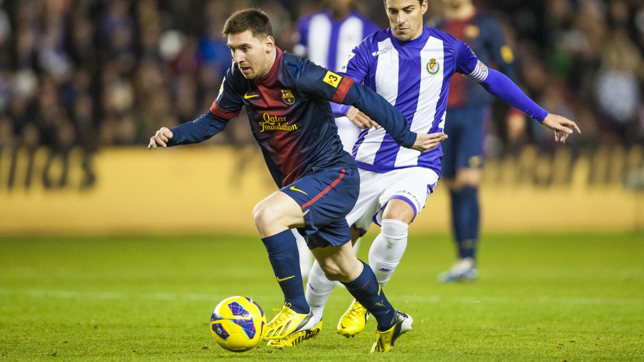 Lionel Messi ends the year on the front foot, scoring his 91st goal of 2012 in Barcelona's 3-1 win at Real Valladolid. 