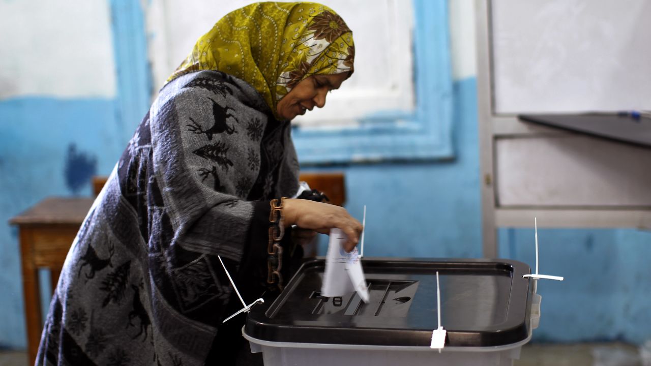 An Egyptian woman casts her ballot south of Cairo, on December 22.