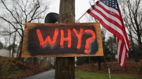 A sign near a cemetery of a victim in the school shooting in Newtown, Connecticut.
