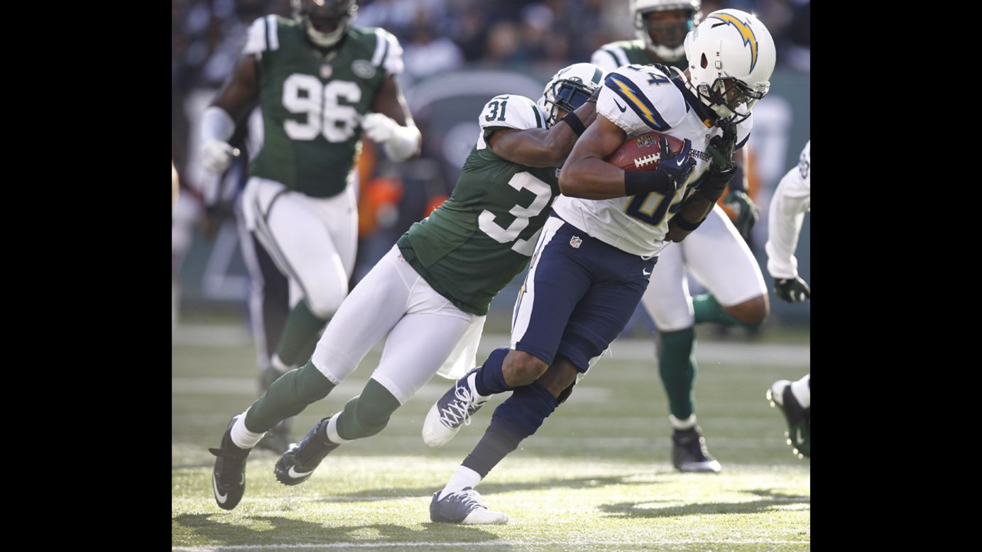 Antonio Cromartie of the Jets takes down Danario Alexander of the Chargers on Sunday.