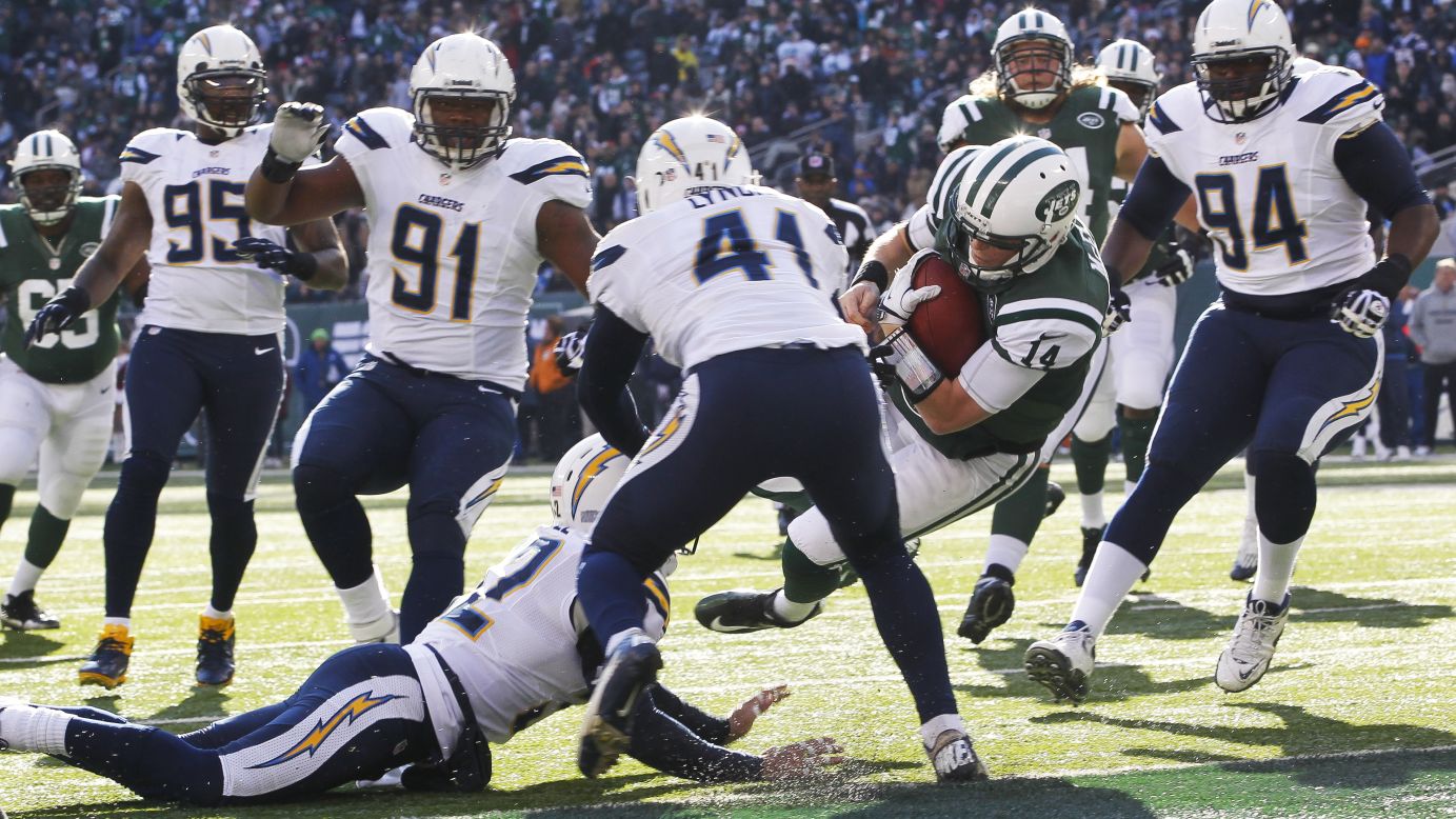 Greg McElroy of the Jets scrambles for a first down against the Chargers on Sunday.