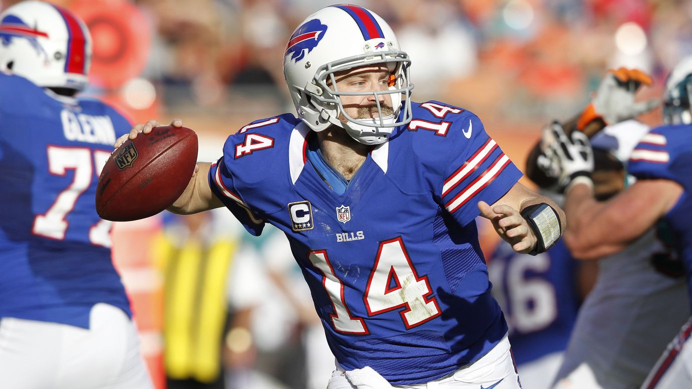 Ryan Fitzpatrick of the Bills runs with the ball out of the pocket against the Dolphins on Sunday.