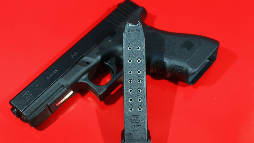 In this photo illustration a Glock pistol with a 17 round magazine is seen on December 18, 2012 in Miami, Florida. 