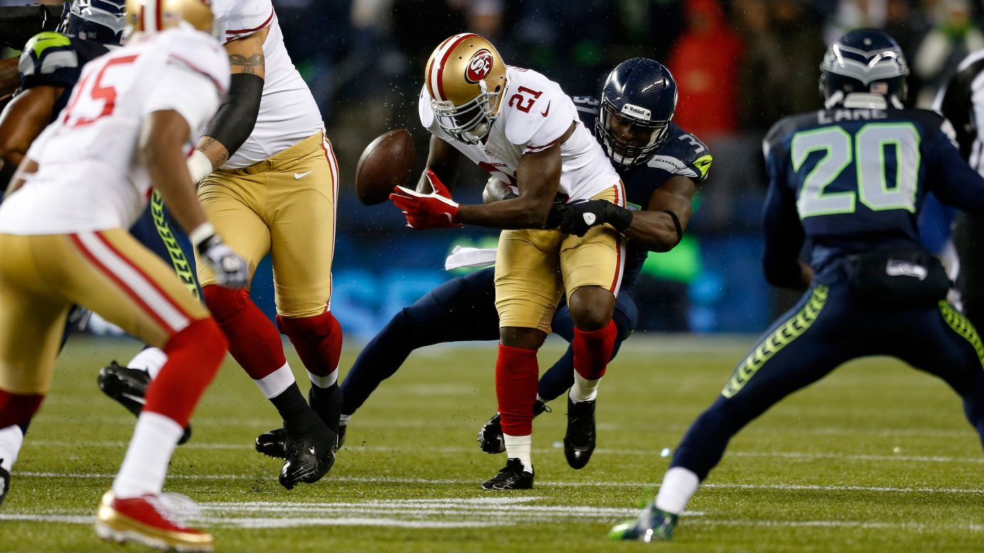 Frank Gore of the San Francisco 49ers fumbles the ball on Sunday.