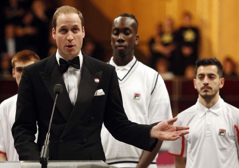 Britain's Prince William, Duke of Cambridge, speaks alongside young people for the Centrepoint charity at the Royal Albert Hall in London on December 8, 2012. The prince, 30, also met with Serbian tennis player Novak Djokovic at the Winter Whites Gala.