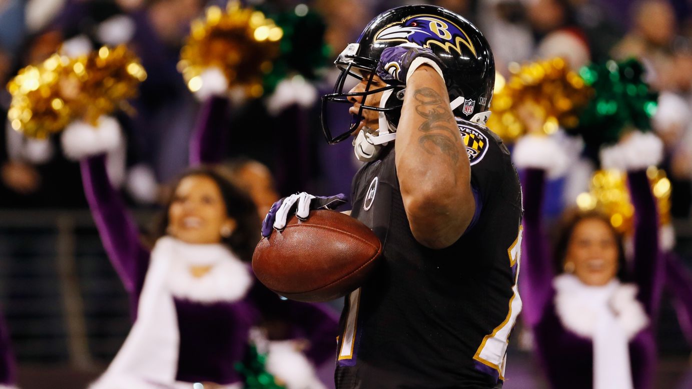 Running back Ray Rice of the Ravens celebrates after catching a first half touchdown pass against the Giants on Sunday.